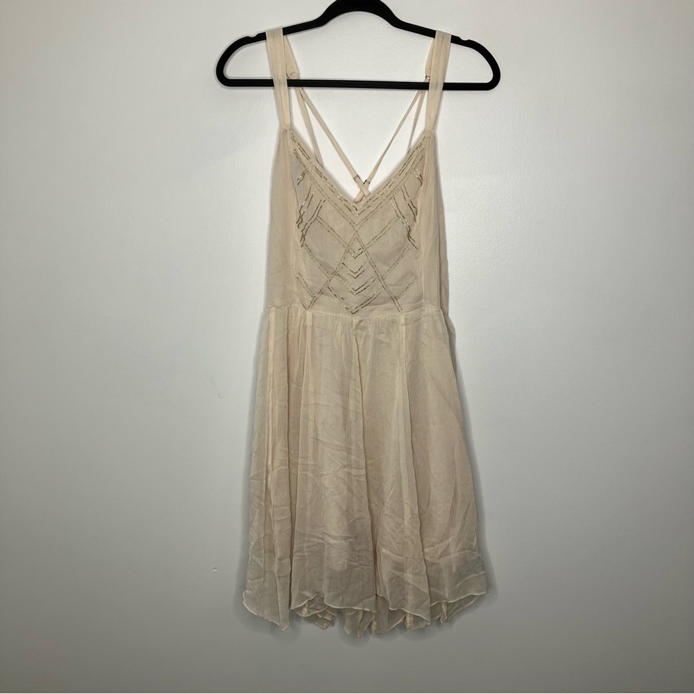 Sleeveless Beige V-Neck Sundress with Embroidered Bodice